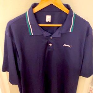 Classic retro polo made by Salzenger.  Piping of green and white on collar.